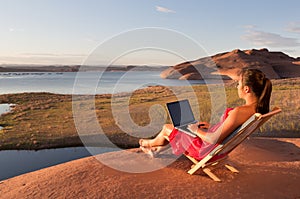 Girl Working while at Lake Powell