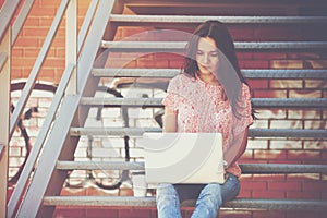 Girl working with laptop