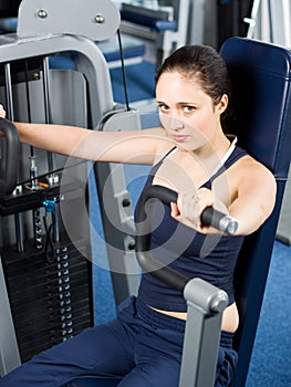 Girl working out in the gym