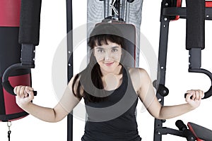 Girl workout with weights machine