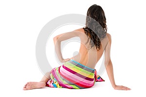 Girl wrapped with colored towel