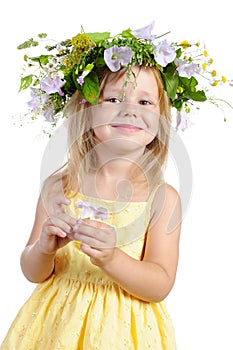 Girl with a wreath of flowers.