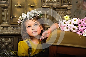 GIRL WITH wreaths of flowers on the head