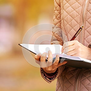 Girl write poem at notebook. Business concept idea. Lady education