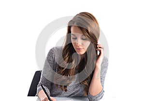 Girl writing on paper