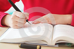 Girl writing for study