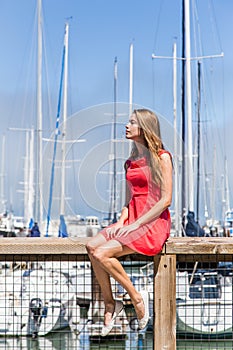 Girl in a yachting marina