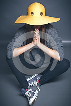 Girl in yellow hat