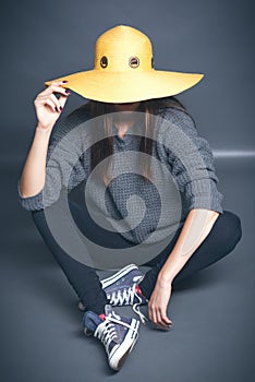 Girl in yellow hat