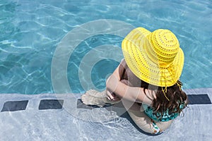 Girl Yellow Hat Pool