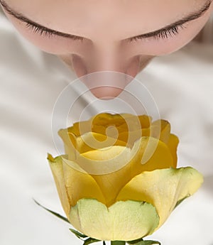 Girl and yellow rose