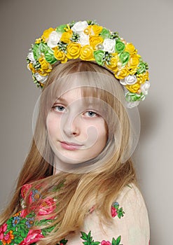 Girl in the yellow spring kokoshnik. Russian image in a shawl Shrovetide.