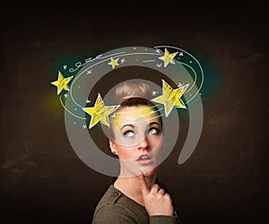 Girl with yellow stars circleing around her head illustration