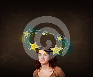 Girl with yellow stars circleing around her head