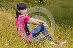 Girl and yellow weeds