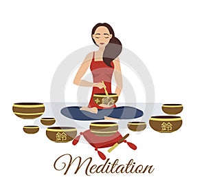 Girl yoga meditates with Tibetan singing bowls. Woman plays music. Relaxation after yoga. Enlightenment with deep music.