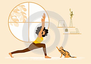 Girl in yoga pose at home with her cat