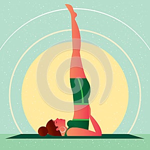 Girl in Yoga Shoulderstand Pose or Sarvangasana