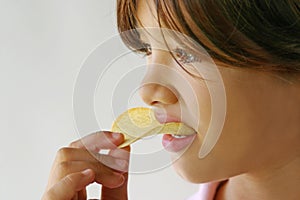 Girl and yummy potato chip