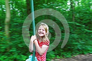 Girl on Zip Wire Having Fun