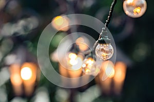 Girland at Christmas market, Christmas tree background, selective focus, Riga, Latvia