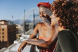 Girlfriends hanging out at a LA rooftop