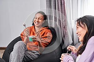 Girlfriends having personal conversation at home