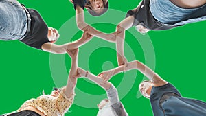 The girlfriends join the wrists in the center making a circle shape.