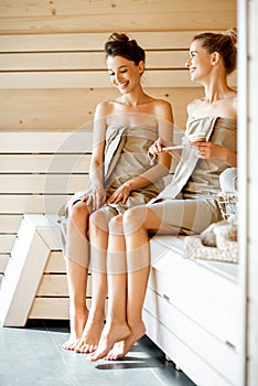 Girlfriends in the sauna