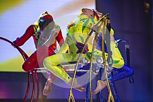 Girls acrobats perform a number