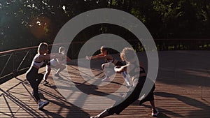 Girls athlete engaged in sports. Athletic young women doing morning exercises.