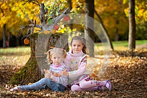 Girls in the autumn park
