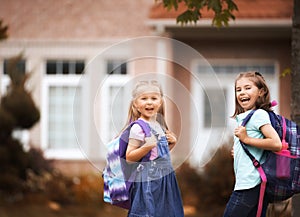 Girls with backpack is going to school