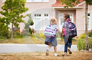 Girls with backpack is going to school