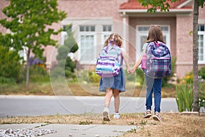 Girls with backpack is going to school