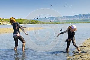 Girls battle in mud