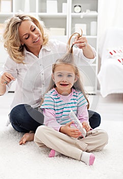 Girls beauty ritual - combing hair