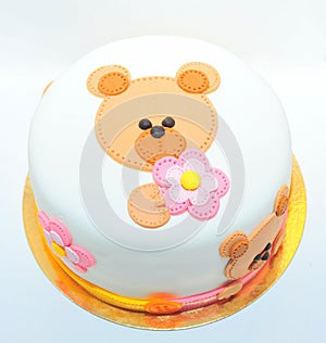 Girls birthday cake with a fondant teddy bear