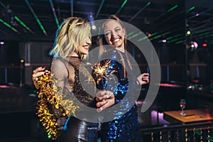 Girls celebrating new years eve at the nightclub.