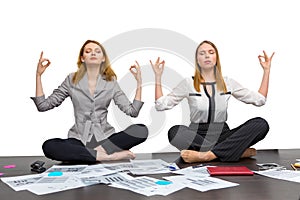 Girls colleagues meditate