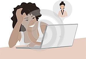 Girls of different nationalities at home or in the office at a desk with a laptop. Communication via online video, urgent meeting