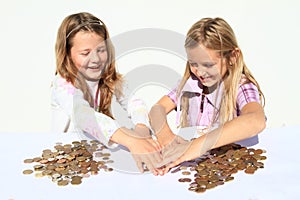 Girls dividing money photo