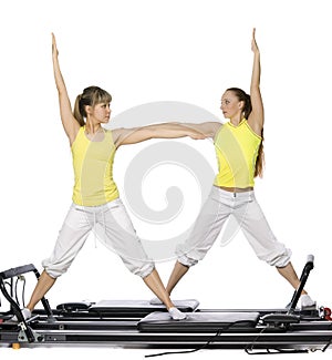 Girls are doing pilates