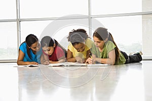 Girls doing schoolwork. photo