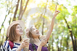 girls drinking bubble tea and enjoy summer vacation