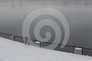 Girls on the embankment of the dnieper in kiev in winter