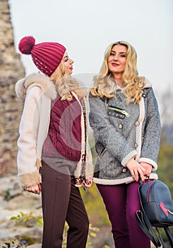 Girls enjoy free time together. women in tweed jacket and half-length coat. warm clothes in fall. sexy women nature