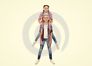 girls friends having fun and jumping. friendship of two children. happy girls sisterhood. children have fun together