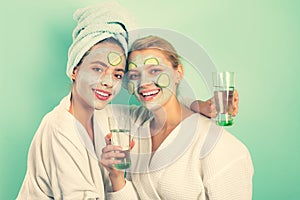 Girls friends sisters making clay facial mask. Anti age mask. Stay beautiful. Skin care for all ages. Women having fun