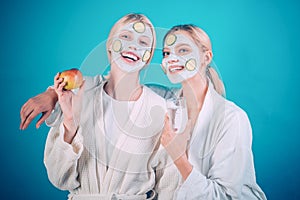 Girls friends sisters making clay facial mask. Anti age mask. Stay beautiful. Skin care for all ages. Women having fun